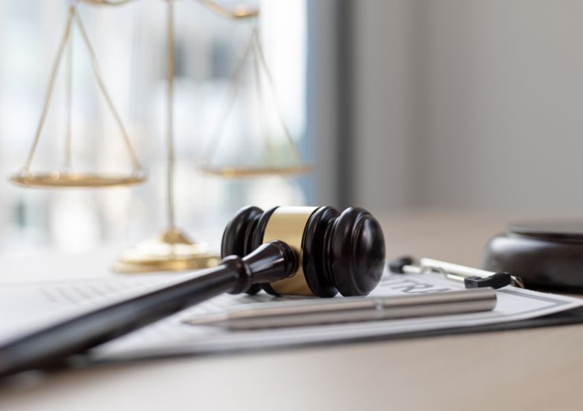 judges gavel on top of a contract