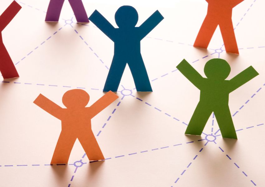 different coloured figurines connected by dotted lines