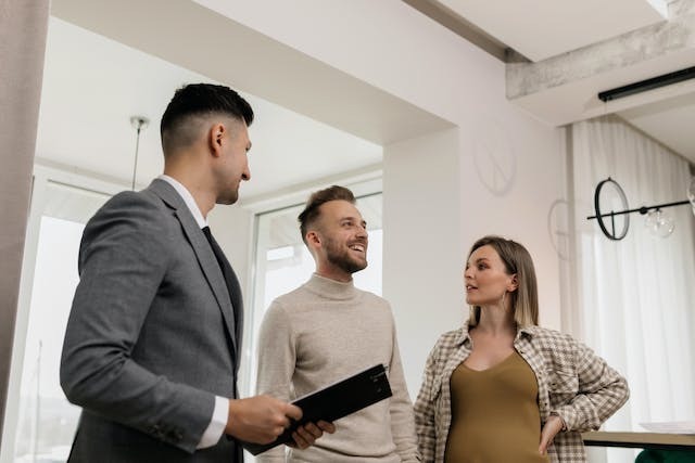 property managers conducting a move-in inspection with two tenants
