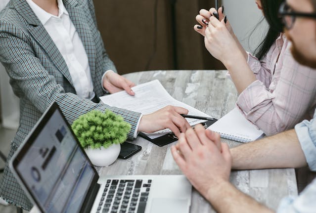 two people going over rental documents